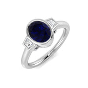 Oval Blue Sapphire & Baguette Diamond Bezel Engagement Ring in 10K/14K gold and platinum with certified lab-grown or natural diamonds