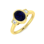 Oval Blue Sapphire & Baguette Diamond Bezel Engagement Ring in 10K/14K gold and platinum with certified lab-grown or natural diamonds