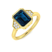 Emerald Cut London Blue Topaz Ring with Round Side Accents in 10K/14K gold and platinum with certified lab-grown or natural diamonds