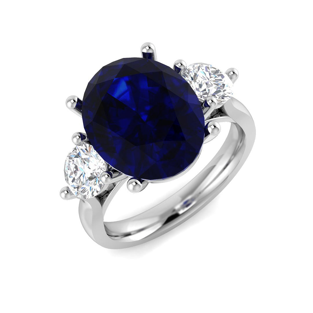 Blue Sapphire Three Stone Ring with Oval Sapphire & Round Diamonds in 10K/14K gold and platinum with certified lab-grown or natural diamonds
