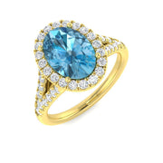 Oval Cut Blue Topaz Halo Ring with Natural Pave Diamonds in 10K/14K gold and platinum with certified lab-grown or natural diamonds