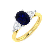 Blue Sapphire Three Stone Ring with Pear Diamond Side Stones in 10K/14K gold and platinum with certified lab-grown or natural diamonds