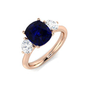 Cushion Cut Blue Sapphire Ring with Natural Round Side Stones Trilogy in 10K/14K gold and platinum with certified lab-grown or natural diamonds