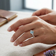 Oval Cut Aquamarine Ring with Diamond Side Stones in 10K/14K gold and platinum with certified lab-grown or natural diamonds
