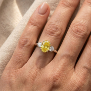 Oval Cut Natural Yellow Diamond Three Stone Engagement Ring with Side Diamonds in 10K/14K gold and platinum with certified lab-grown or natural diamonds