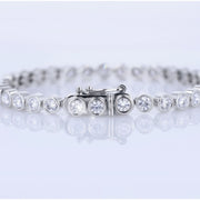 Bezel Set Diamond Tennis Bracelet in 10K/14K gold and platinum with certified lab-grown or natural diamonds