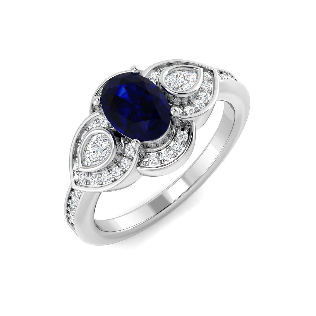 Oval Blue Sapphire Three Stone Ring with Pear Diamond Halo Accents in 10K/14K gold and platinum with certified lab-grown or natural diamonds