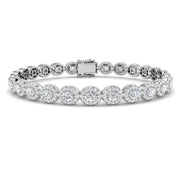 Natural Diamond Oval Halo Tennis Bracelet with Box Clasp and Safety Latch in 10K/14K gold and platinum with certified lab-grown or natural diamonds