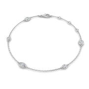 Natural Oval & Round Cut Bezel Set Diamond Station Bracelet in Platinum with Lobster Claw in 10K/14K gold and platinum with certified lab-grown or natural diamonds