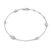 Natural Oval & Round Cut Bezel Set Diamond Station Bracelet in Platinum with Lobster Claw in 10K/14K gold and platinum with certified lab-grown or natural diamonds