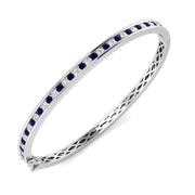 Blue Sapphire and Natural Diamond Channel Set Gemstone Bangle in 10K/14K gold and platinum with certified lab-grown or natural diamonds