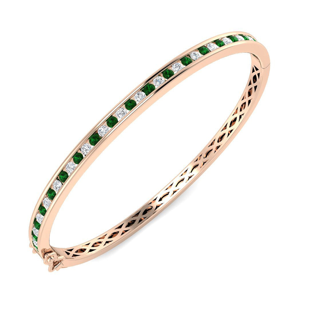 Natural Diamond and Emerald Channel Set Hinged Bangle with Box Clasp in 10K/14K gold and platinum with certified lab-grown or natural diamonds