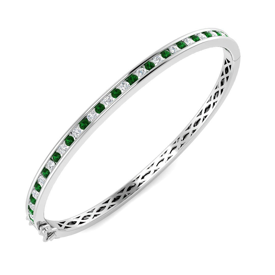 Natural Diamond and Emerald Channel Set Hinged Bangle with Box Clasp in 10K/14K gold and platinum with certified lab-grown or natural diamonds