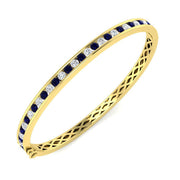 Blue Sapphire and Natural Diamond Channel Set Gemstone Bangle in 10K/14K gold and platinum with certified lab-grown or natural diamonds