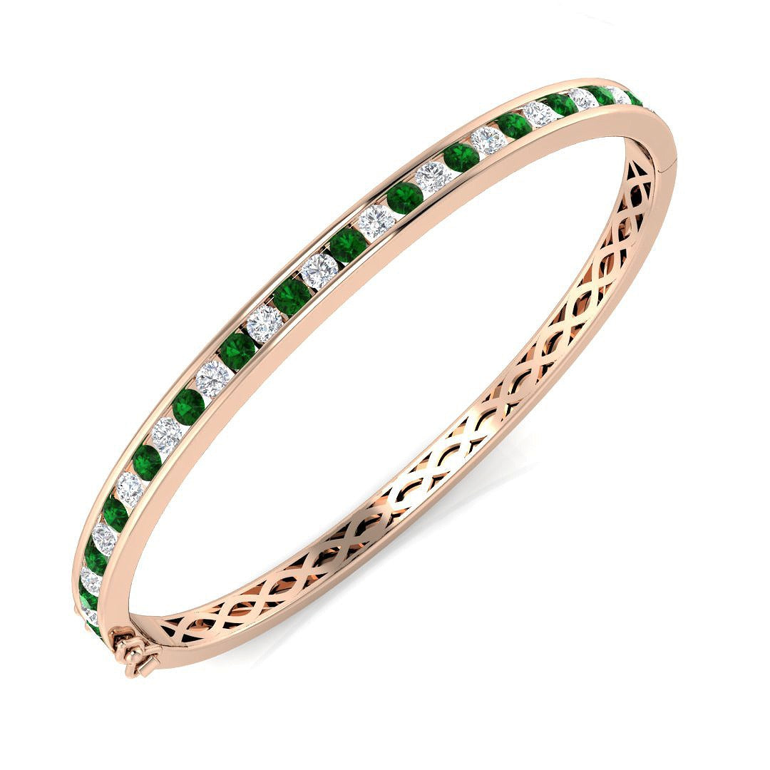 Natural Diamond and Emerald Channel Set Hinged Bangle with Box Clasp in 10K/14K gold and platinum with certified lab-grown or natural diamonds