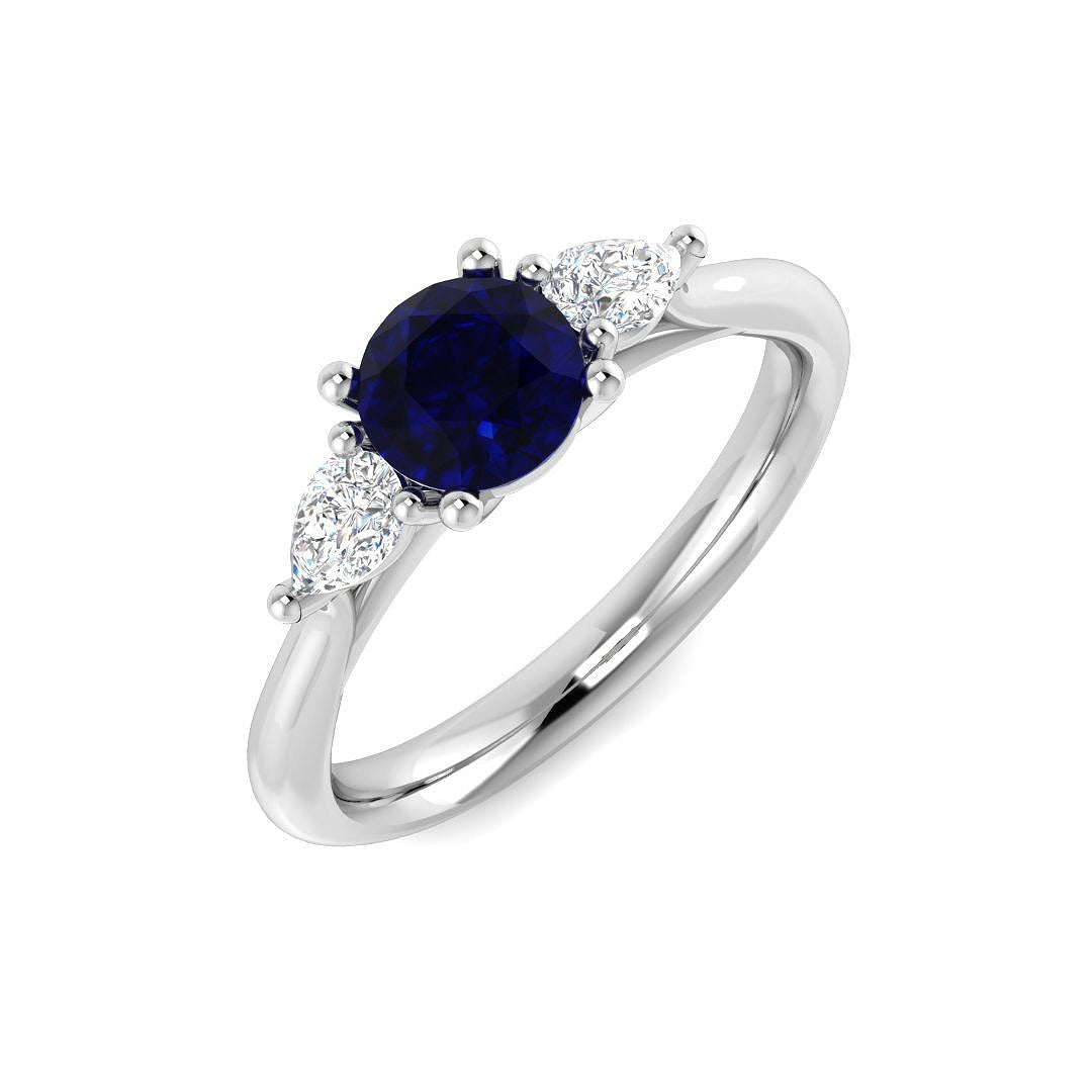 Round Blue Sapphire Three Stone Ring in 10K/14K gold and platinum with certified lab-grown or natural diamonds