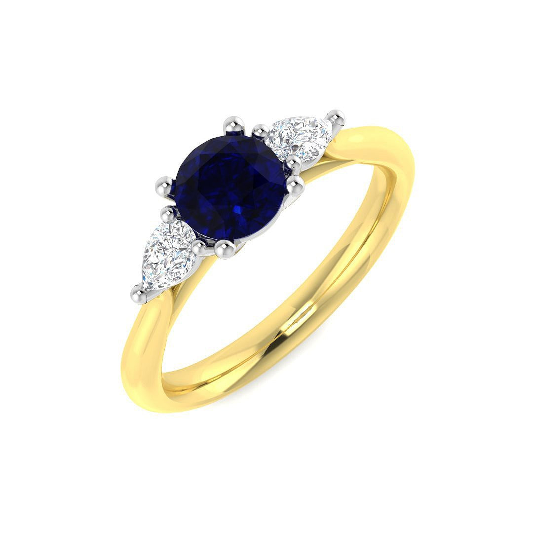 Round Blue Sapphire Three Stone Ring in 10K/14K gold and platinum with certified lab-grown or natural diamonds
