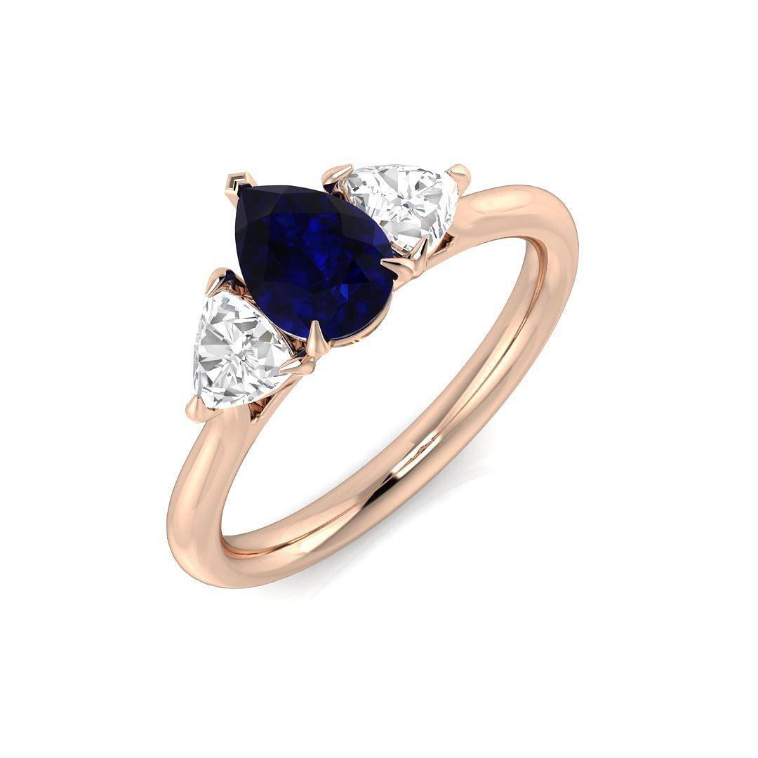 Pear Cut Blue Sapphire Ring with Trillion Cut Side Stone Trilogy Ring in 10K/14K gold and platinum with certified lab-grown or natural diamonds