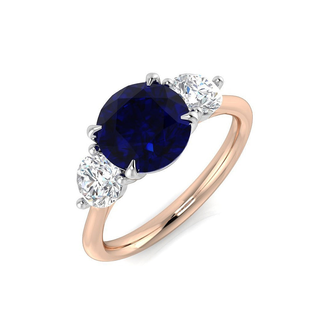 Round Sapphire Three Stone Engagement Ring in 10K/14K gold and platinum with certified lab-grown or natural diamonds