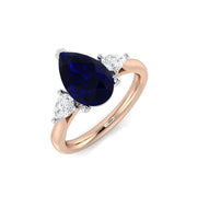 Blue Sapphire Three Stone Ring Pear Cut Trilogy with Natural Diamonds in 10K/14K gold and platinum with certified lab-grown or natural diamonds