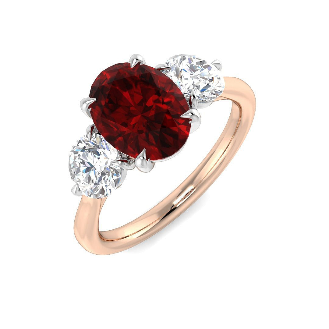 Ruby Three Stone Ring with Oval Cut & Diamond Side Stones in 10K/14K gold and platinum with certified lab-grown or natural diamonds