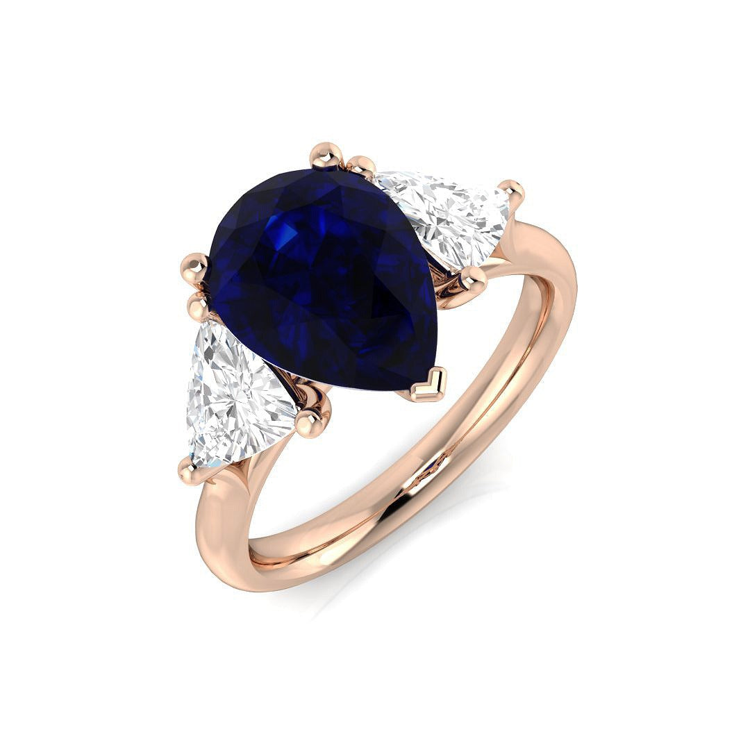 Pear Cut Blue Sapphire Ring with Trillion Cut Side Stone Trilogy Ring in 10K/14K gold and platinum with certified lab-grown or natural diamonds