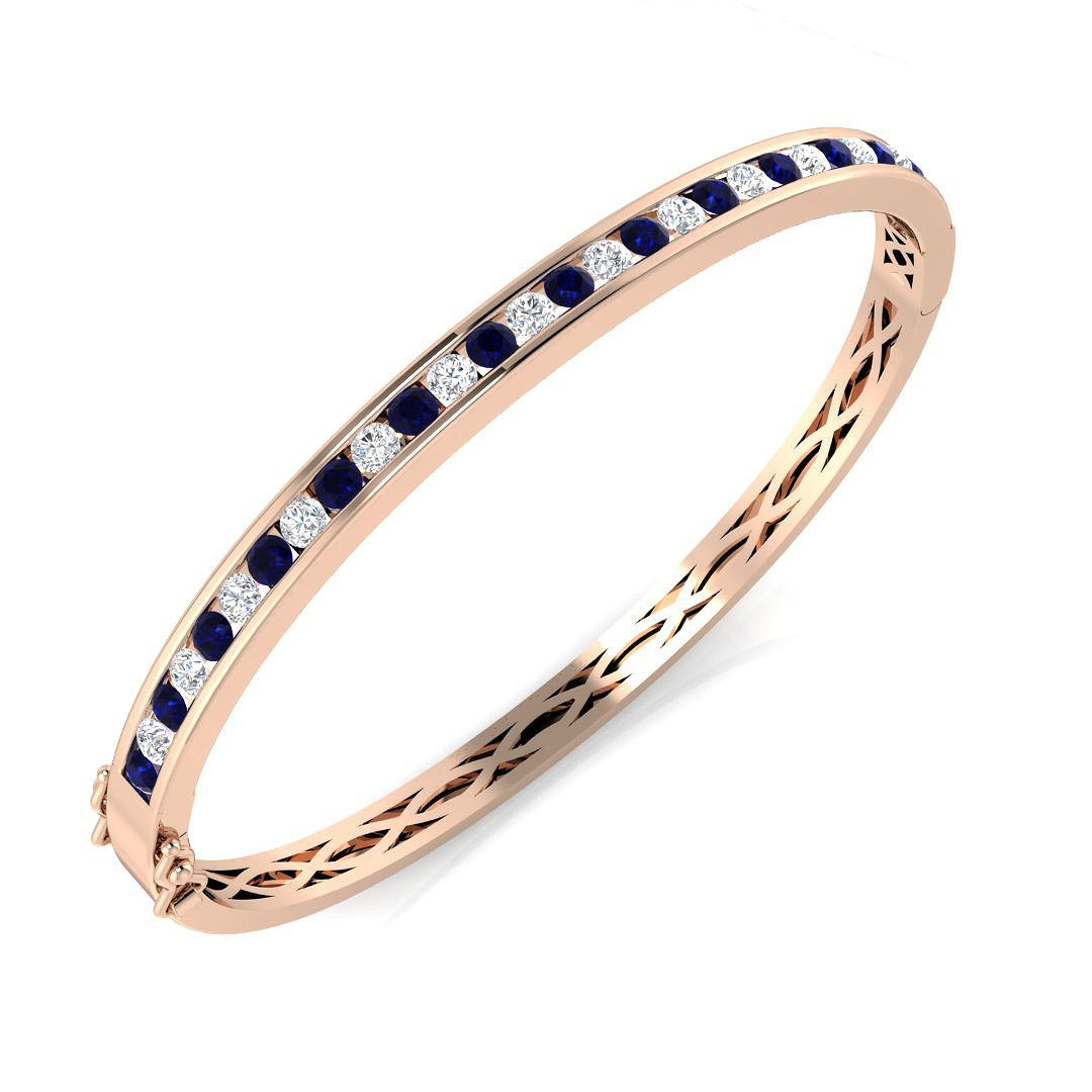 Blue Sapphire and Natural Diamond Channel Set Gemstone Bangle in 10K/14K gold and platinum with certified lab-grown or natural diamonds