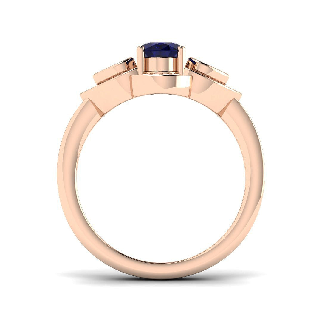 Oval Blue Sapphire Three Stone Ring with Pear Diamond Halo Accents in 10K/14K gold and platinum with certified lab-grown or natural diamonds