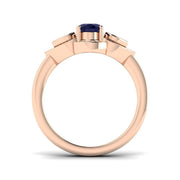 Oval Blue Sapphire Three Stone Ring with Pear Diamond Halo Accents in 10K/14K gold and platinum with certified lab-grown or natural diamonds