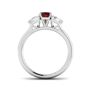 Ruby Trilogy Ring with Pear Cut Ruby & Trillion Diamond Side Stones in 10K/14K gold and platinum with certified lab-grown or natural diamonds