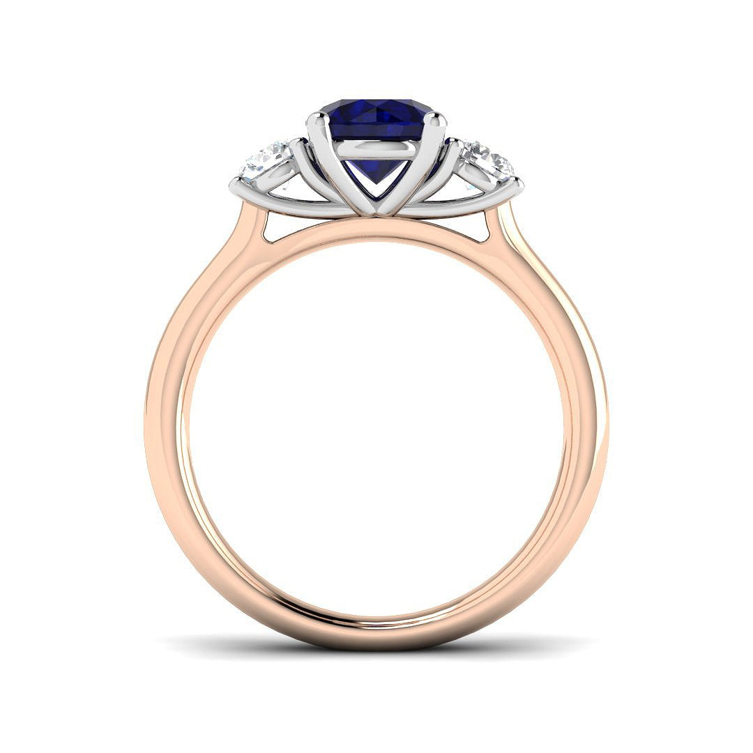 Round Blue Sapphire Three Stone Ring in 10K/14K gold and platinum with certified lab-grown or natural diamonds