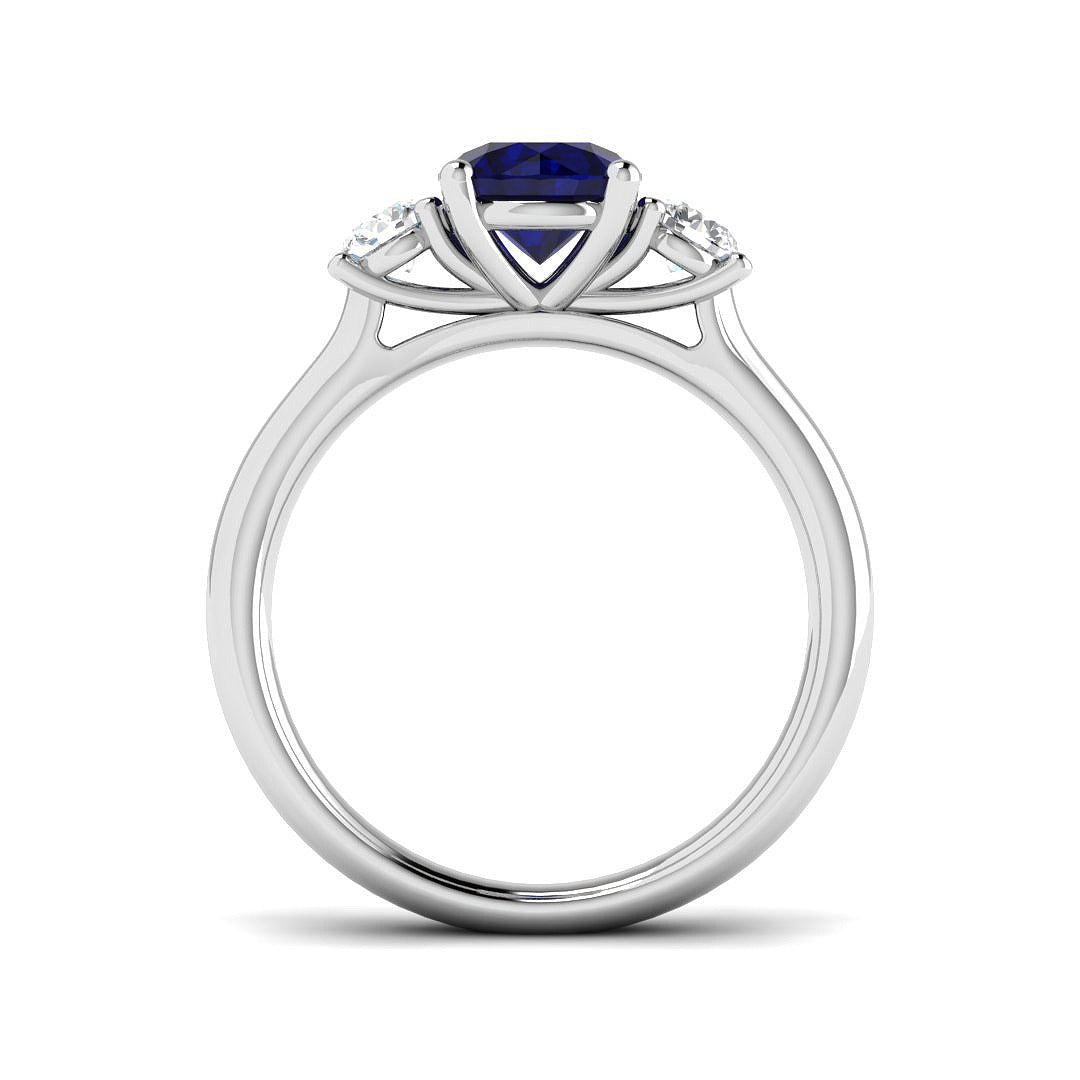 Round Blue Sapphire Three Stone Ring in 10K/14K gold and platinum with certified lab-grown or natural diamonds