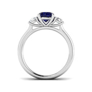 Round Blue Sapphire Three Stone Ring in 10K/14K gold and platinum with certified lab-grown or natural diamonds