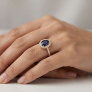 Oval Blue Sapphire Halo Ring with Pave Natural Diamond Band in 10K/14K gold and platinum with certified lab-grown or natural diamonds