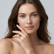 Oval Blue Sapphire Halo Ring with Pave Natural Diamond Band in 10K/14K gold and platinum with certified lab-grown or natural diamonds