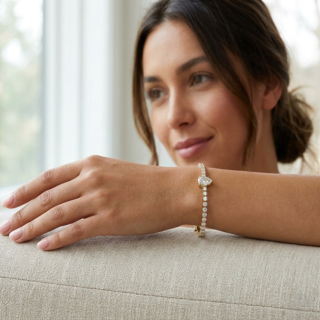 Pear Cut Lab Grown Diamond Tennis Bracelet with Round Prong Set Diamonds in 10K/14K gold and platinum with certified lab-grown or natural diamonds