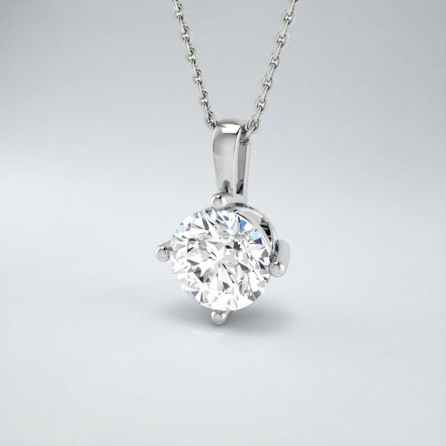 Round Diamond Solitaire Pendant in 10K/14K gold and platinum with certified lab-grown or natural diamonds