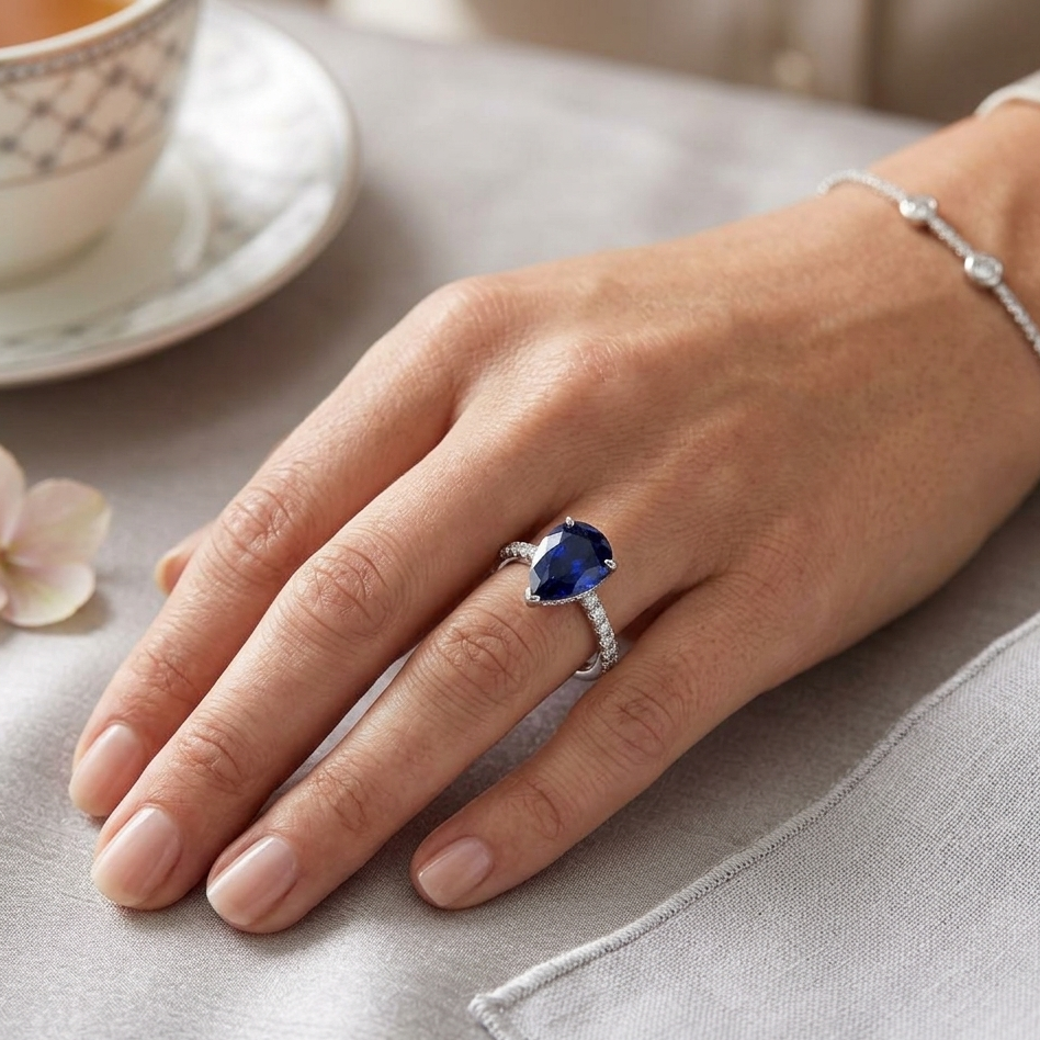 Pear Cut Blue Sapphire Ring with Natural Diamond Pave Band in 10K/14K gold and platinum with certified lab-grown or natural diamonds