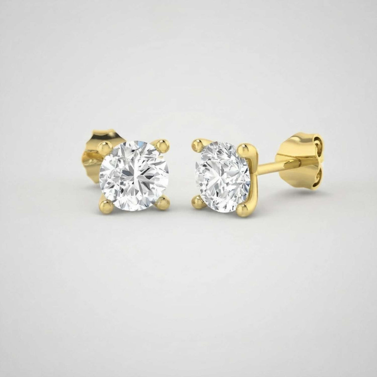 Stud Earrings with Round Brilliant Cut Diamonds - DE/VVS - Gold & in 10K/14K gold and platinum with certified lab-grown or natural diamonds