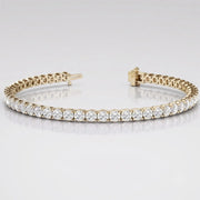 Prong Set Lab Grown Diamond Tennis Bracelet in 10K/14K gold and platinum with certified lab-grown or natural diamonds
